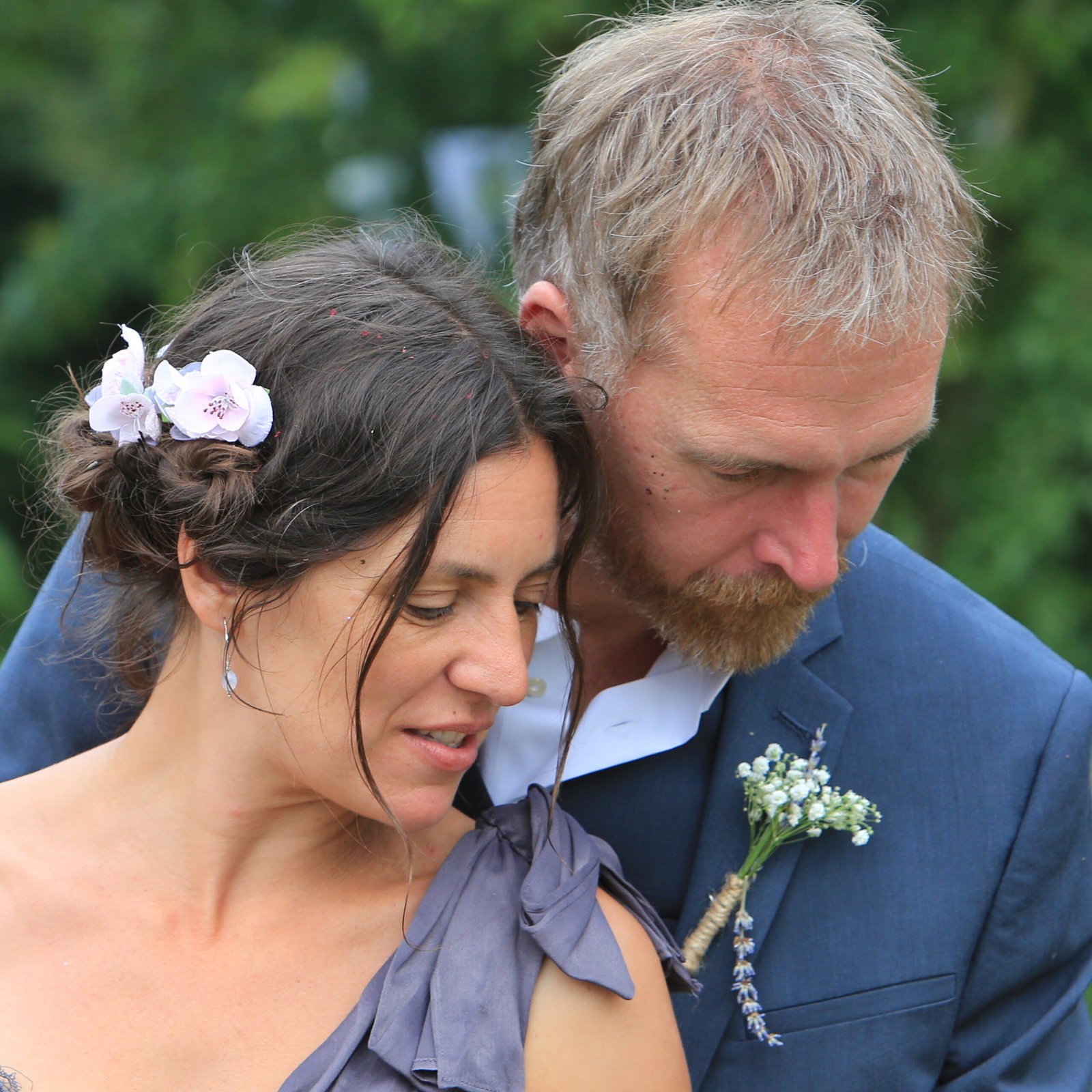 A couple sharing a quiet moment during their wedding ceremony